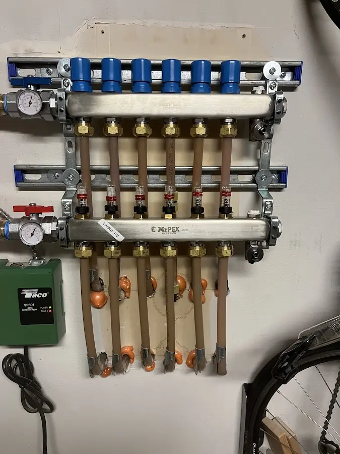 Plumber performing Gas Line Installation at a residential property in Covington